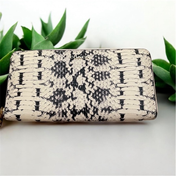 Coach Handbags - Coach Python Embossed Long Zip Wallet NWT 
MSRP $525 shown in receipt